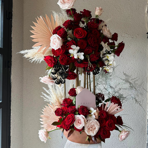 Arrangement in Crazy in Red Deluxe Vase 