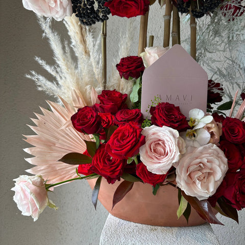 Arrangement in Crazy in Red Deluxe Vase 