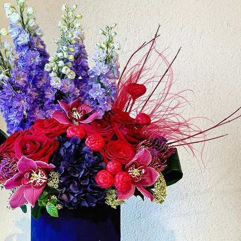 Fiery Blossom Arrangement in Navy Blue Velvet Box