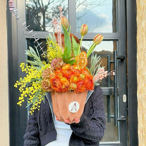 Arrangement in Mini Orange Glow Vase 