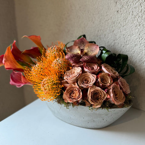 A New Day Arrangement in a Concrete Vase 