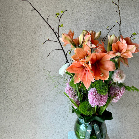 Vase of Amarlis Arrangement in a Glass Vase 