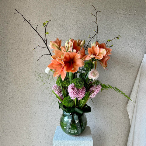 Vase of Amarlis Arrangement in a Glass Vase 